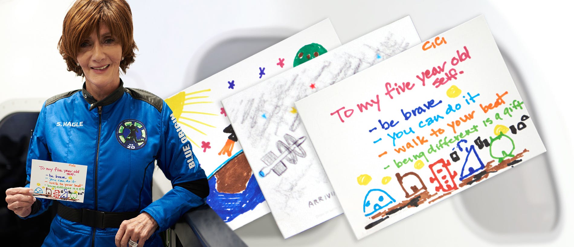 Sharon Hagle (left) next to sample postcards with space-related drawings
